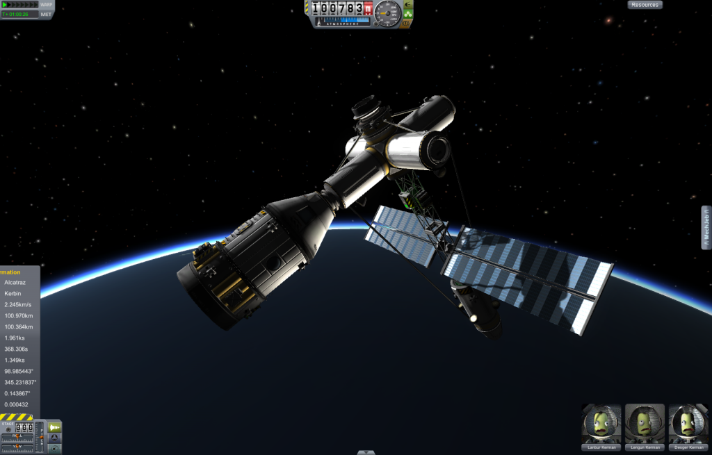 Crew quarters and 3 Kerbals docked with the space station. Note the illumination lighting up the station.