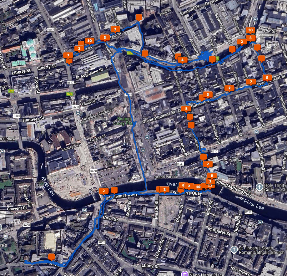 A satellite view of Cork City with a blue line showing where I walked and orange squares showing how many photos I took at various locations.